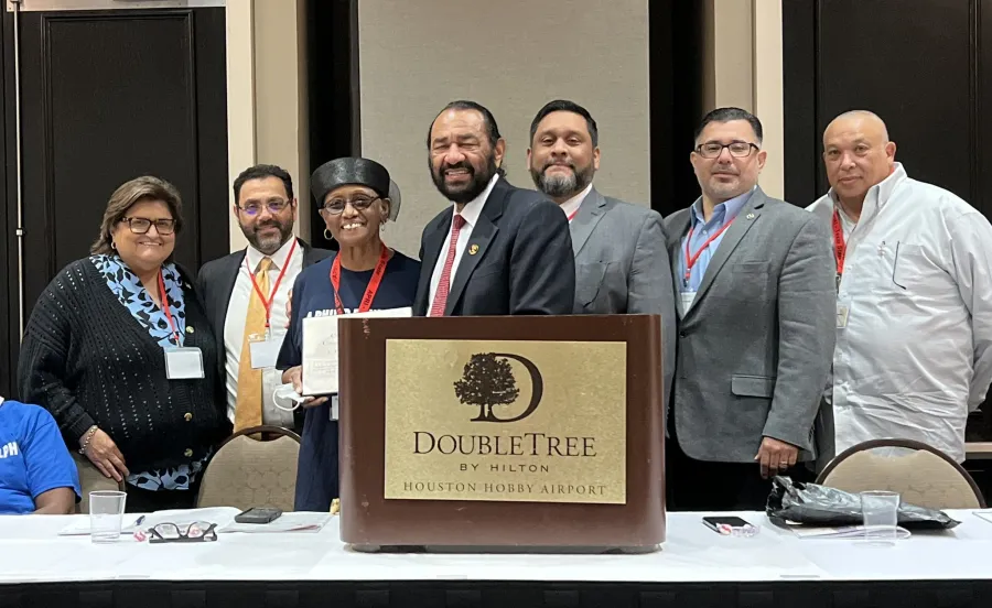 Texas AFL-CIO Secretary-Treasurer Leonard Aguilar joins members of the Texas A. Philip Randolph Institute at their 50th anniversary celebration.